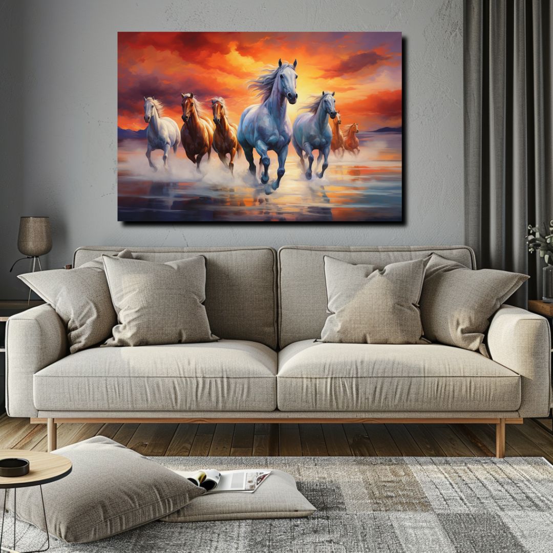 Canvas painting of seven running horses in white and brown with a yellow and orange sky background. Perfect for living room decor, this vibrant wall art also functions as a vastu painting